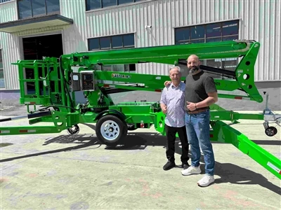 Canadian Client Inspects Custom FB18 Towable Boom Lift At Factory Before Shipment